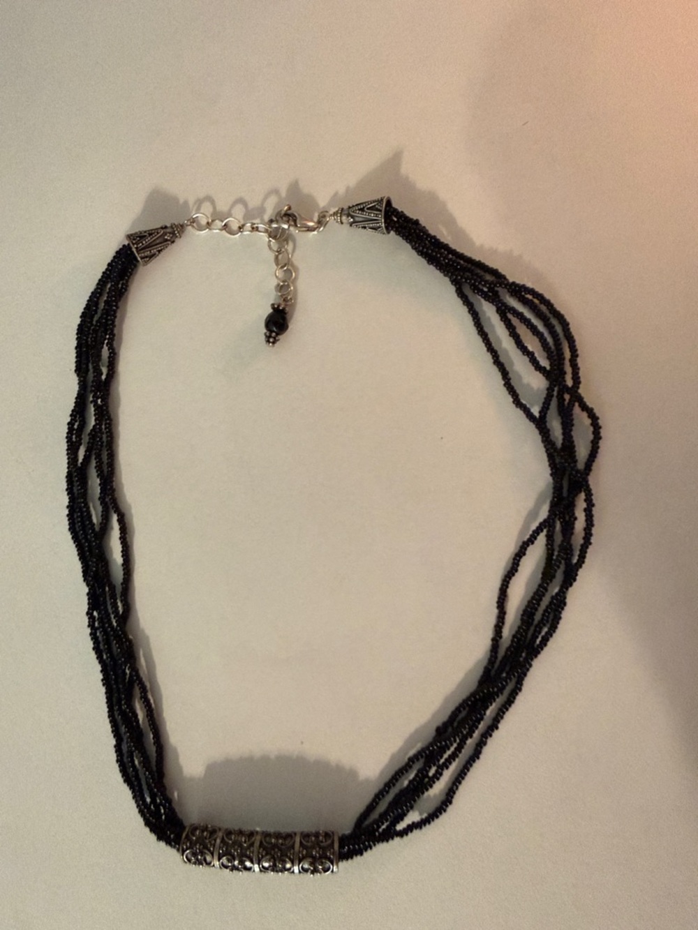 Multi-Strand Black Beaded Necklace with Silver Accent